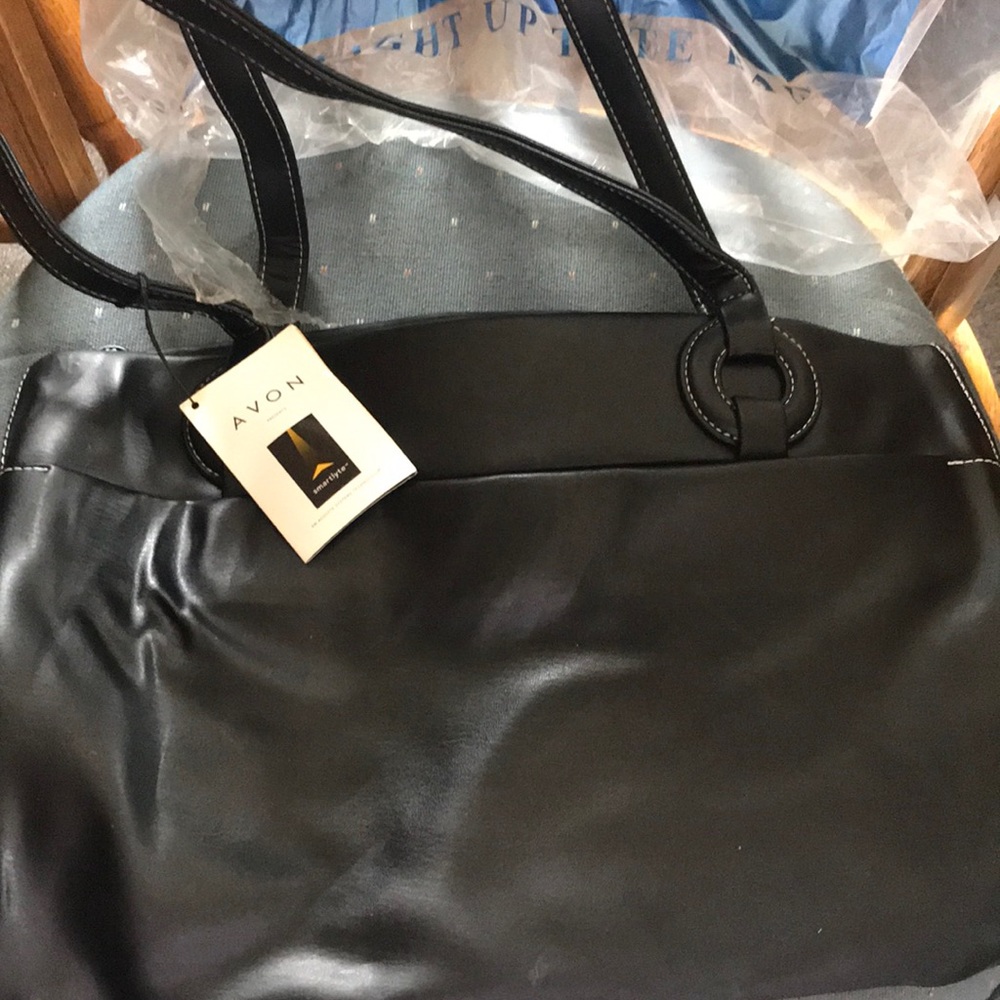 Avon black light up bag